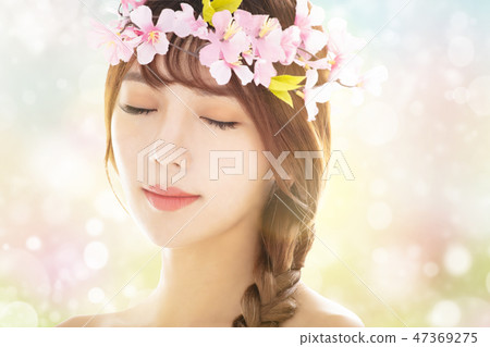 closeup young beauty face with spring background closeup young beauty face with spring background 47369275