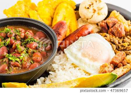 Traditional Colombian dish called Bandeja paisa Traditional Colombian dish called Bandeja paisa 47369657