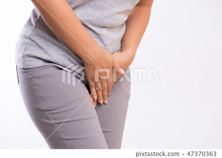 Young woman having painful stomachache 47370363