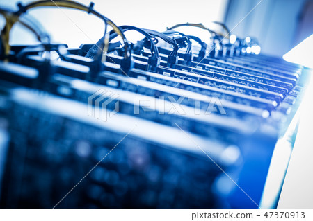 Bitcoin miners standing in a row. Bitcoin miners standing in a row. 47370913