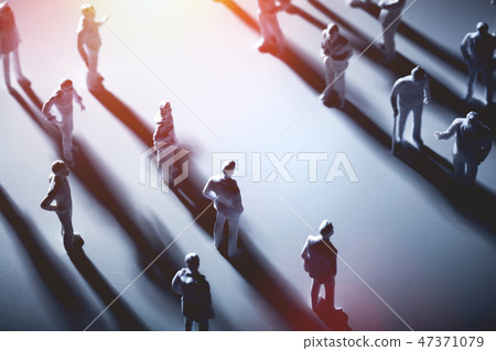 Two groups of people separated by blank space. 47371079