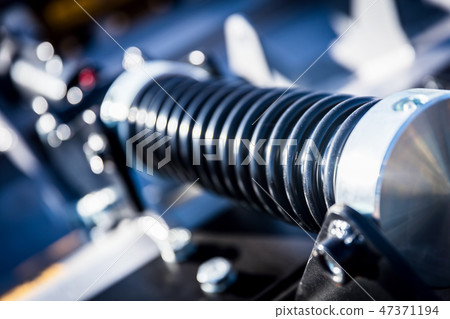 Spring-shaped industrial cylinder. Railway industry Spring-shaped industrial cylinder. Railway industry 47371194