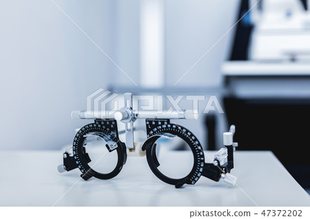 Eye test glasses at doctor's office. 47372202