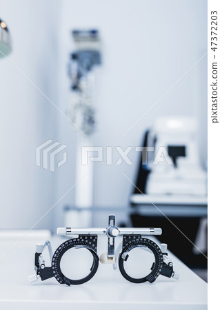 Eye testing glasses in optician's office. 47372203