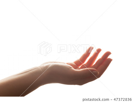 Hand in gesture of holding, giving. Strong backlight, isolated on white Hand in gesture of holding, giving. Strong backlight, isolated on white 47372836
