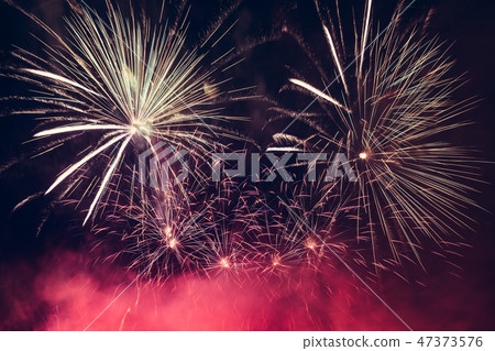 Spectacular fireworks show light up the sky. New year celebration. Spectacular fireworks show light up the sky. New year celebration. 47373576