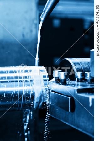 Industrial turning machine at work close-up 47374389