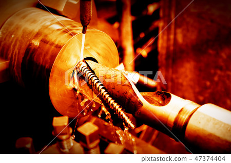 Industrial turning, threading machine at work 47374404