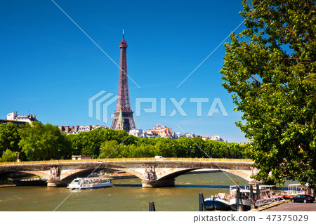 Eiffel Tower and bridge on Seine river in Paris, France. 47375029