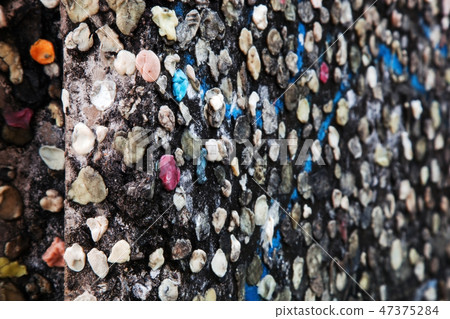Part of Berlin Wall with graffiti and chewing gums Part of Berlin Wall with graffiti and chewing gums 47375284