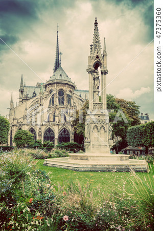 Notre Dame Cathedral in Paris, France. Square Jean XXIII. Vintage 47375360
