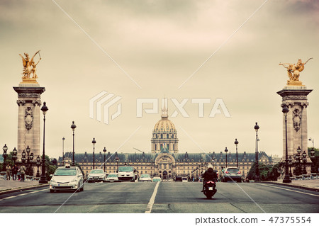 Les Invalides seen from Pont Alexandre III bridge in Paris, France. Vintage Les Invalides seen from Pont Alexandre III bridge in Paris, France. Vintage 47375554