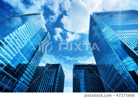 Modern business skyscrapers, high-rise buildings, architecture raising to the sky, sun 47375666