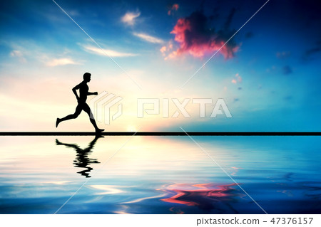 Silhouette of man running at sunset Silhouette of man running at sunset 47376157