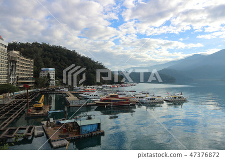 View of Sun Moon Lake with the passenger boats View of Sun Moon Lake with the passenger boats 47376872