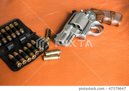 Revolver handgun with ammunition bullet 47379647