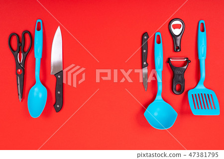 top view of stylish kitchen utensils isolated on red background top view of stylish kitchen utensils isolated on red background 47381795