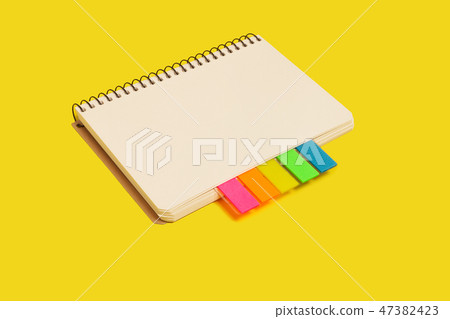 spiral notebook with sticky notes 47382423