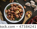 Seasoning fried peanut bean in a ceramic bowl 47384241