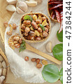 Seasoning fried peanut bean in basket, bean snack 47384244