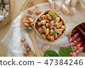 Seasoning fried peanut bean in basket, bean snack 47384246