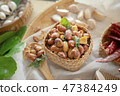Seasoning fried peanut bean in basket, bean snack 47384249