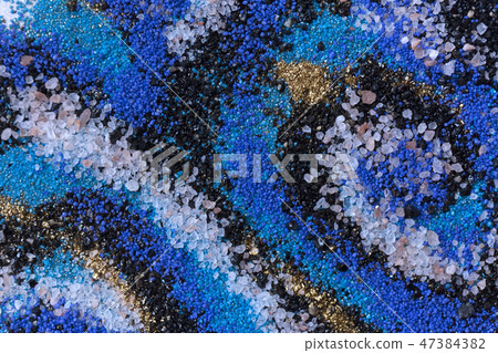 Layered colorful sand pattern. Marble style background. Blue and gold powder texture. 47384382