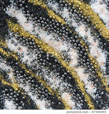 Layered colorful sand pattern. Marble style background. Black and gold powder texture. 47384443