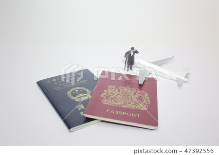 a mini figure with pasport on board a mini figure with pasport on board 47392556