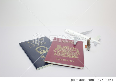 a mini figure with pasport on board a mini figure with pasport on board 47392563