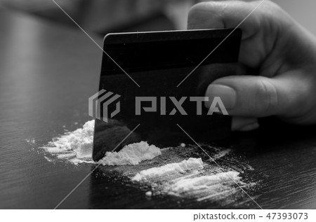 Cocaine powder on the table Cocaine powder on the table 47393073