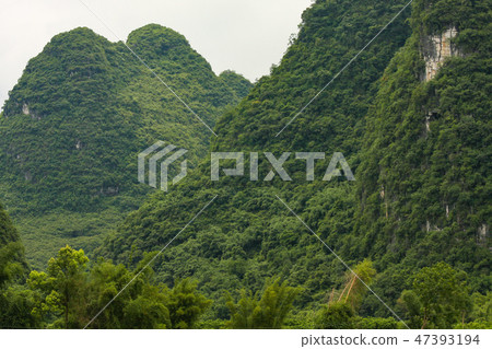 Karst mountain landscape in Yangshuo China Karst mountain landscape in Yangshuo China 47393194