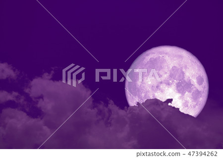 hunger moon on silhouette heap cloud on sunset sky 47394262