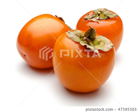 Whole persimmon fruits on white background Whole persimmon fruits on white background 47395503