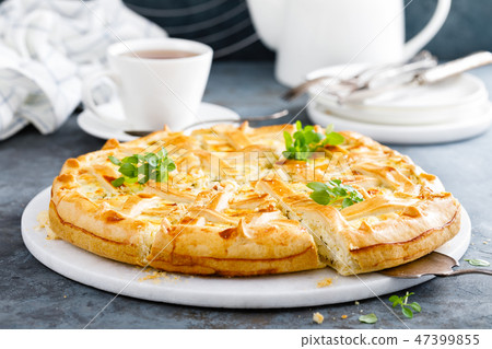 Pie with salted soft cheese and greens Pie with salted soft cheese and greens 47399855