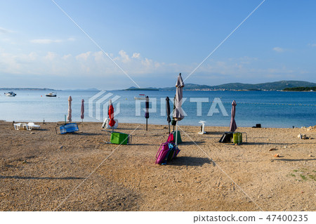 Beach in Turanj, small village in Dalmatia, Croatia, island of Pasman in background 47400235