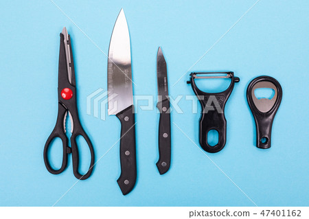 Kitchen utensils isolated on blue background 47401162