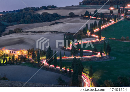 Evening landscapes with car headlights Evening landscapes with car headlights 47401224