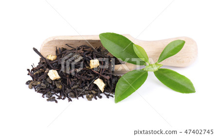 Black and green Ceylon tea with apple and bergamot, isolated on white background. Black and green Ceylon tea with apple and bergamot, isolated on white background. 47402745