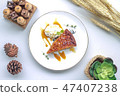 A piece of apple cake on white dish 47407238