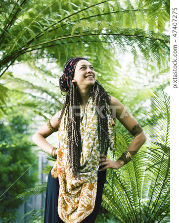 Young cute smiling woman in green park , lifestyle concept happy people Young cute smiling woman in green park , lifestyle concept happy people 47407275