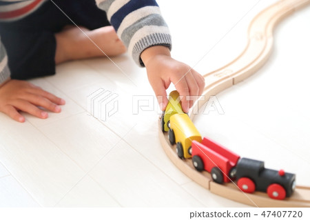 Children playing with train toys 47407720