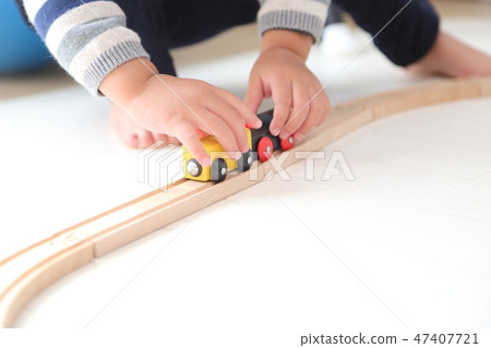 Children playing with train toys 47407721