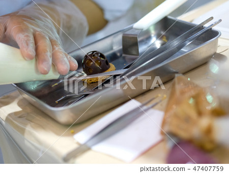 Chef cooking food in the kitchen, preparing food Chef cooking food in the kitchen, preparing food 47407759