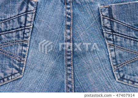 Jeans texture background. Part of the blue jeans 47407914