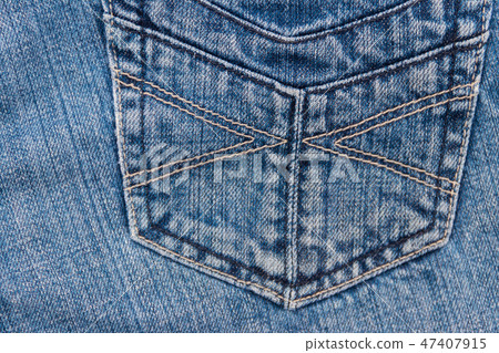 Jeans texture background. Part of the blue jeans 47407915