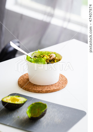 Green salad to go in white paper bowl Green salad to go in white paper bowl 47407974