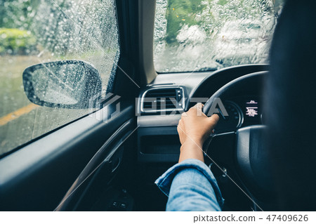 driving in rainy season 47409626