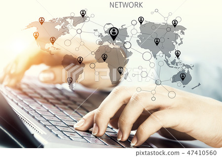 Woman typing on keyboard 47410560