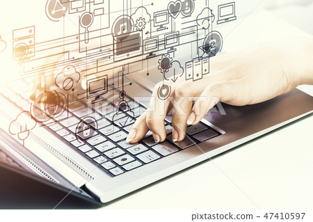 Woman typing on keyboard 47410597